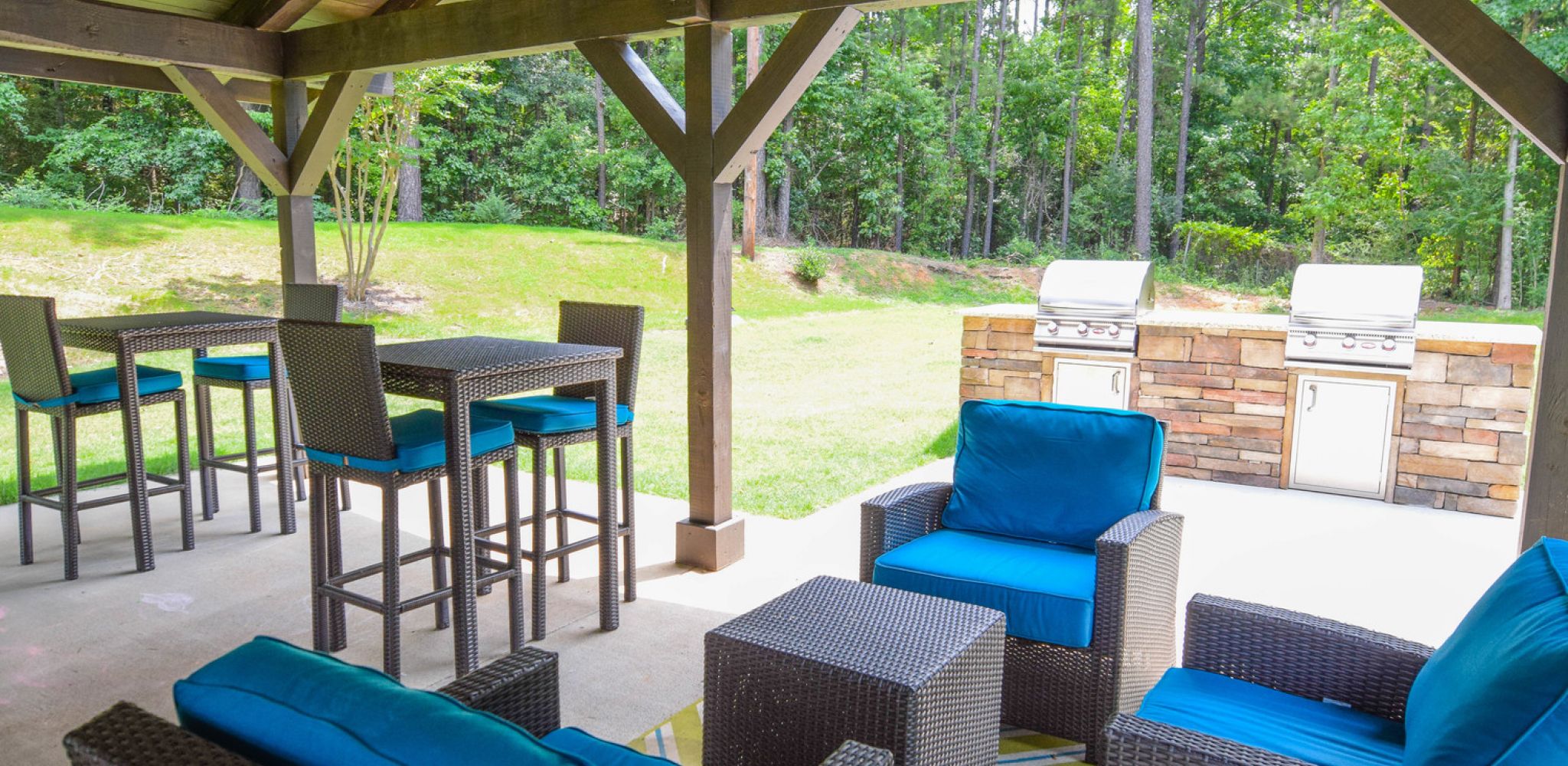 Hawthorne at Wisteria outdoor lounge pavilion with grilling space and lawn